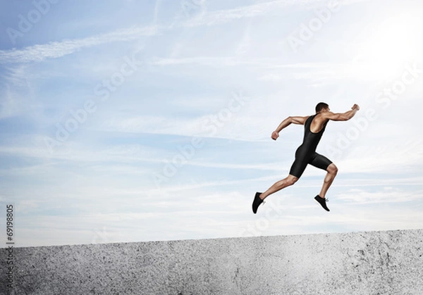 Fototapeta Running athlete