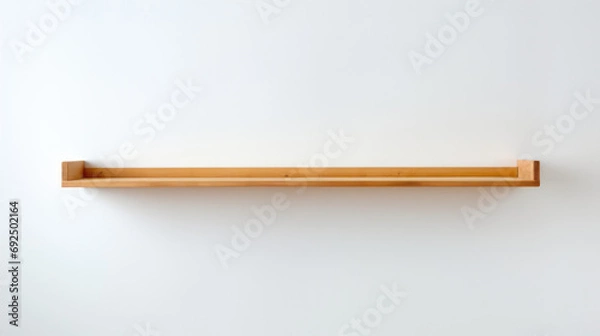 Obraz Minimalist wooden shelf on a clean white wall background with copy space