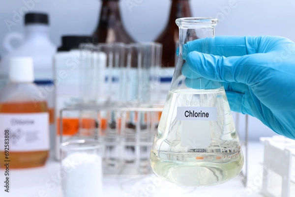 Fototapeta Chlorine in chemical container , chemical in the laboratory and industry