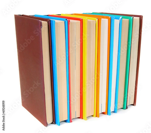 Fototapeta Multi-coloured books. On white background.