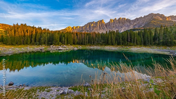 Obraz Lago di Carezza, emerald waters, enchanting Spruce forests, Latemar mountain vistas. A South Tyrol and Dolomites gem, captivating in every frame