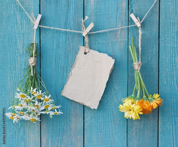 Obraz Two bouquets of camomile and calendula and sheet of paper for me