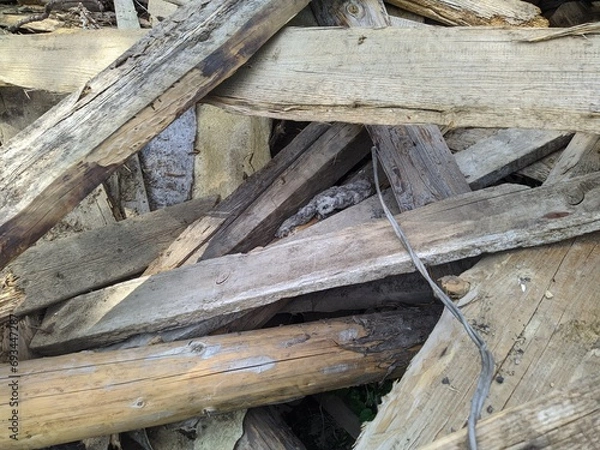 Fototapeta old and broken wooden planks and boards outdoors
