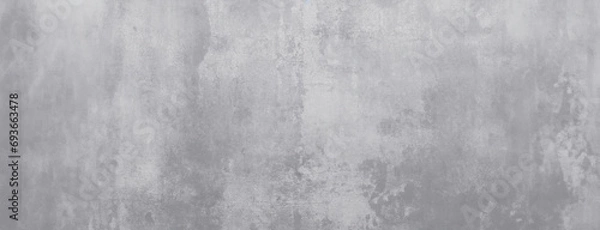 Fototapeta Abstract Concrete Wall with Textured Finish. A wide, high-resolution image of a concrete wall featuring a blend of textures and shades of gray