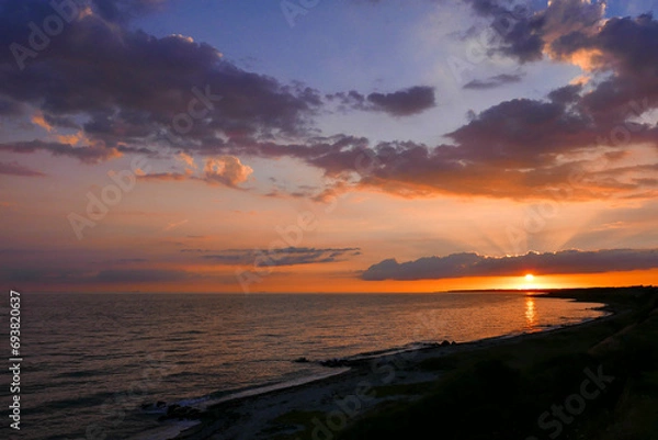 Obraz Tranquil Sunset over Dramatic Ocean Horizon