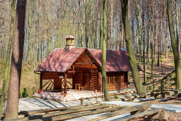 Obraz A charming, tiny wooden church in the forest, Przylasek near Rzeszów