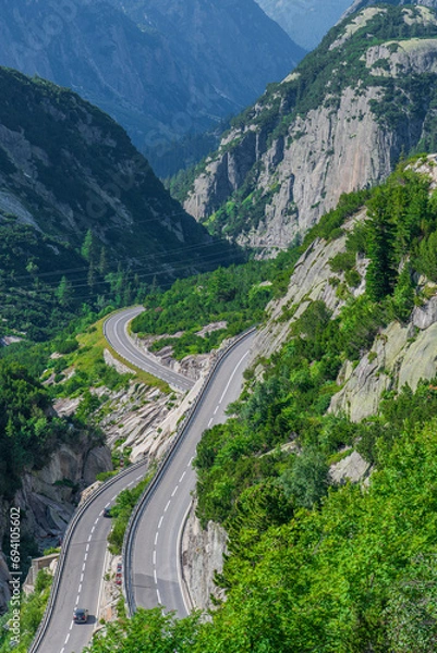 Obraz Road in the mountains. Everything around is green