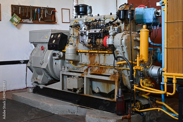 Fototapeta old diesel generator close-up. emergency light shutdown. alternative power.