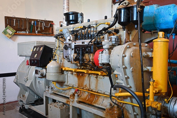Fototapeta old diesel generator close-up. emergency light shutdown. alternative power.