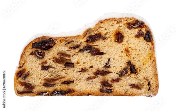 Obraz Slice of sweet stollen isolated on a white background. Cutout of traditional German Holiday bread of nuts, spices, and dried fruits. Close-up of Christstollen slice coated with powdered sugar.