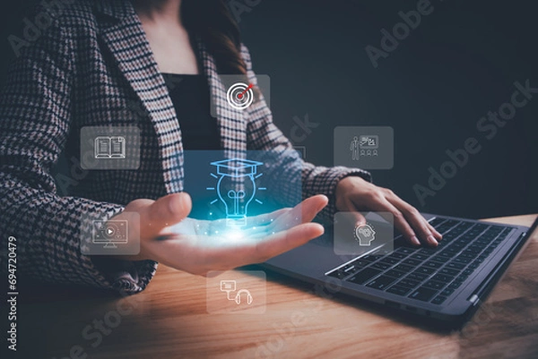 Obraz Woman with virtual screen of training online or E-learning. Internet education course, webinar online, digital courses develop skills thinking idea. E-learning graduate certificate program by video.