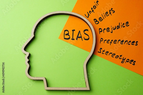 Obraz Outline of the head and a sheet of paper with the inscription bias.