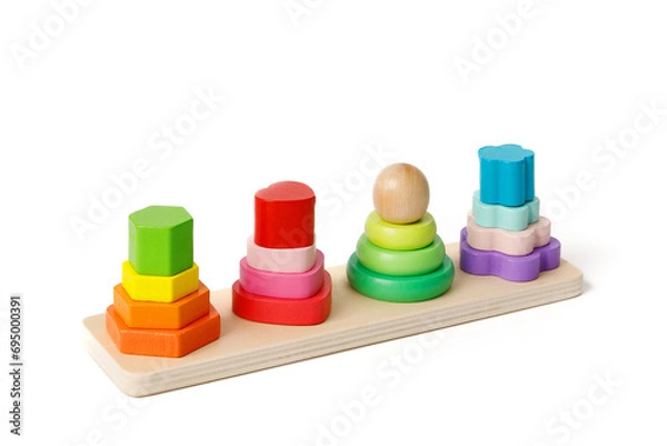 Fototapeta Wooden puzzle toy with colorful blocks in the shape of 4 pyramids isolated on white background.