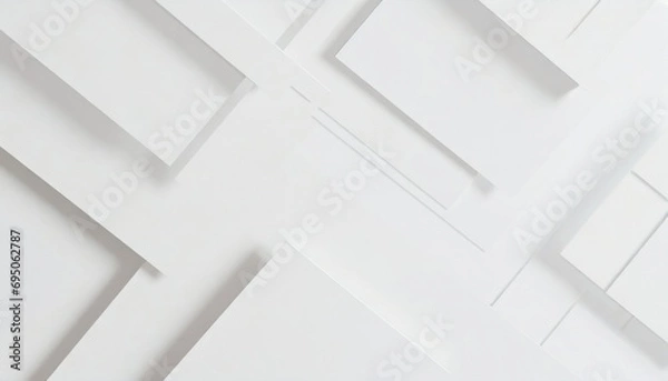 Obraz Abstract white geometric shapes creating a three-dimensional effect on a plain background.