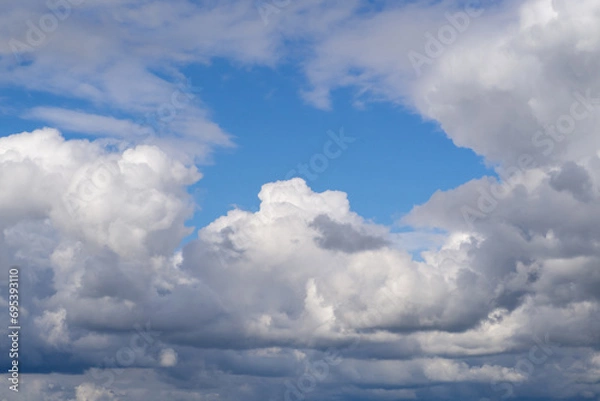 Fototapeta Cloudy sky. Blue sky with lots of cumulus clouds