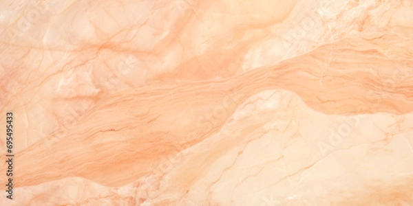 Fototapeta A close up view of a marble surface. Monochrome peach fuzz background.