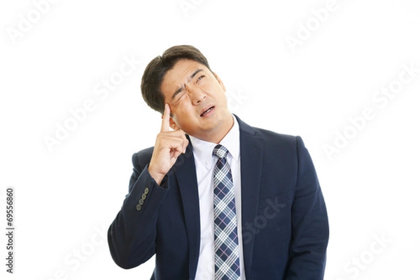 Fototapeta 苦悩するビジネスマン