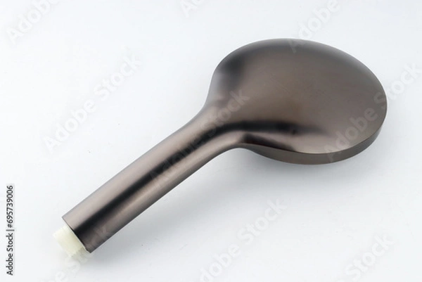 Fototapeta The Brushed Grey Round Hand Shower has a stylish  finish that adds luxury to your bathroom. Its rounded shape gives a modern look, and multiple spray settings let you customize your shower