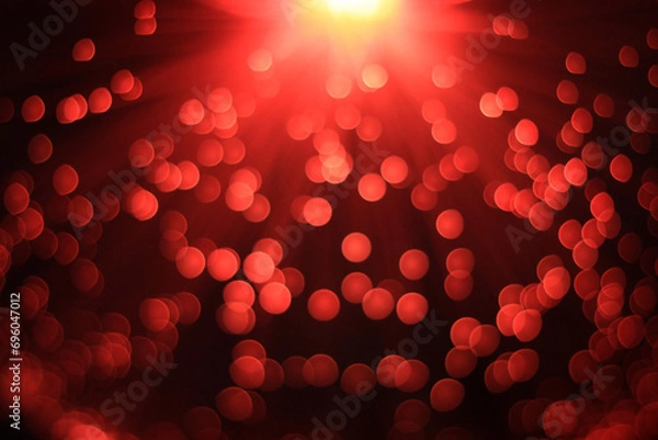 Obraz Festive red and black background with boke and yellow light on top