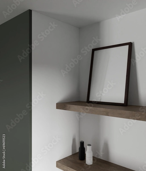Obraz tiny and minimalist dark wooden frame mockup on the wooden kitchen shelf with beautiful decoration