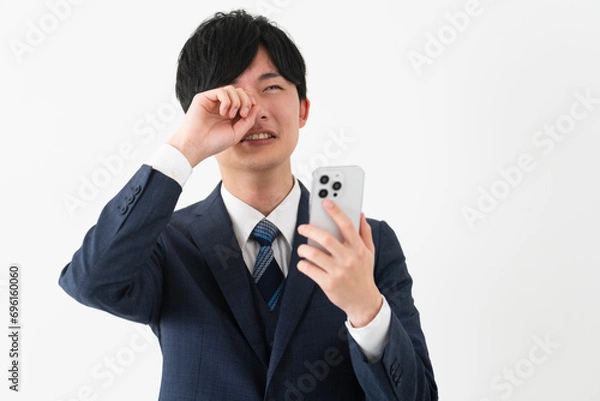 Fototapeta ビジネススーツを着ている若い男性　ビジネスイメージ	
