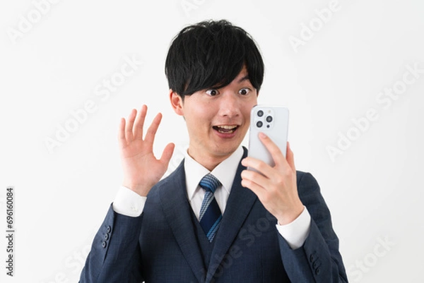 Fototapeta ビジネススーツを着ている若い男性　ビジネスイメージ	
