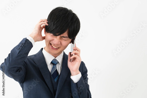 Fototapeta ビジネススーツを着ている若い男性　ビジネスイメージ	
