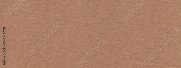 Fototapeta Texture of craft dark brown paper background colors, macro. Structure of vintage kraft umber cardboard.