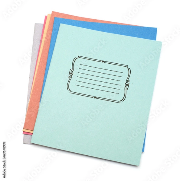 Fototapeta multicolored exercise books over the white background