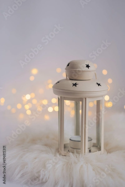 Fototapeta Christmas lantern with bokeh lights on white background. Festive decoration.
