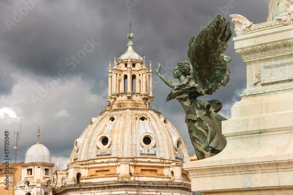 Obraz Statue of a winged woman in the monument to Victor Emmanuel II.