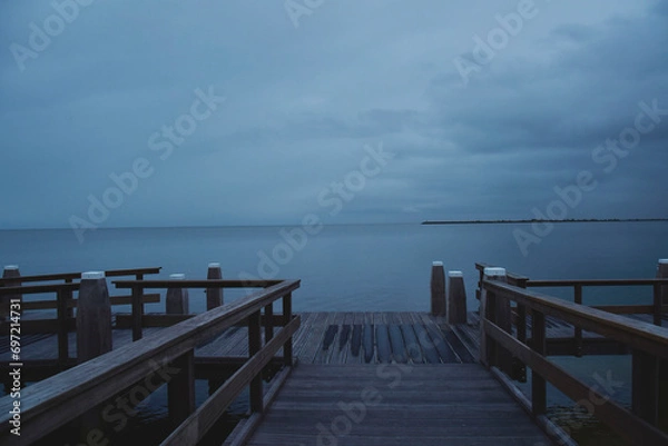 Obraz pier overlooking the sea in a picturesque village