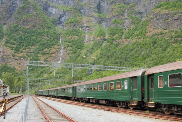 Fototapeta Tracks and passenger train. Flom, Norway