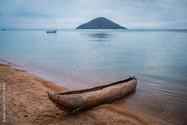 Fototapeta A dugout canoe on the shore of Lake Malawi in Cape Maclear, Malawi