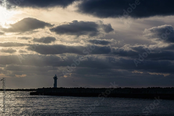 Fototapeta 日の光の射す灯台