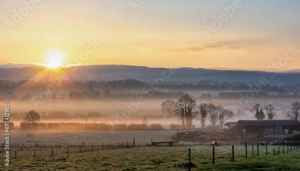 Fototapeta Beautiful Foggy Sunrise at Farm in Ireland