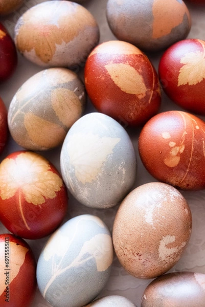 Obraz Easter eggs decorated with natural and leaf-like decorations and colored closeup