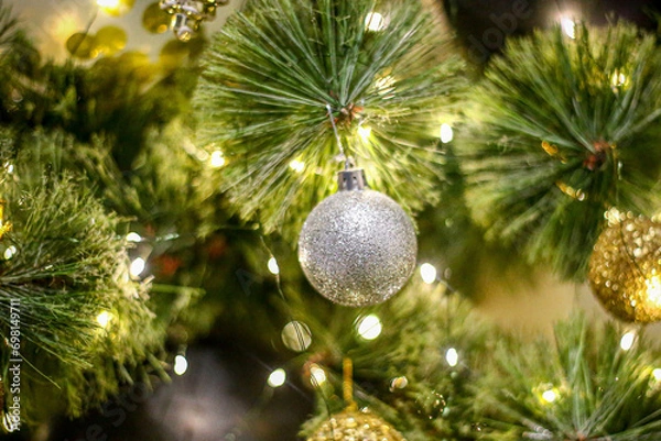 Fototapeta Christmas tree toys on the Christmas tree in the New year and Christmas