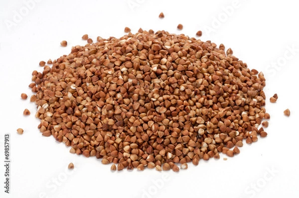Fototapeta Pile of buckwheat on white background