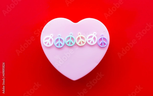 Fototapeta heart shape with peace icon on red background