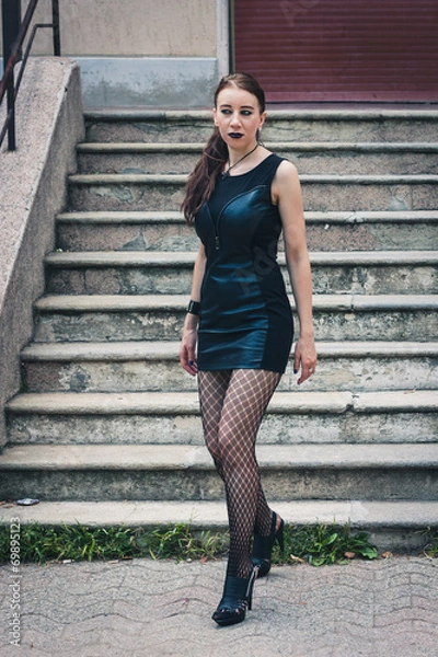 Obraz Pretty goth girl posing in urban landscape