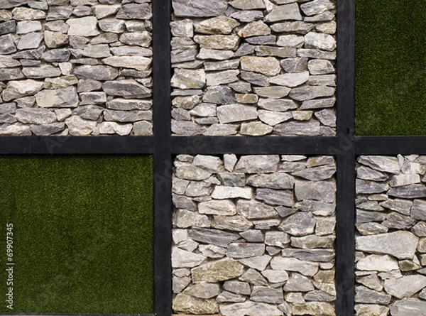 Obraz Artificial grass  and stone wall as background