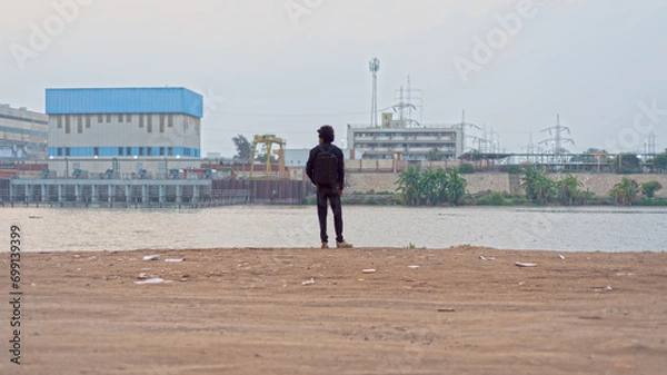 Obraz man standing on the Nile