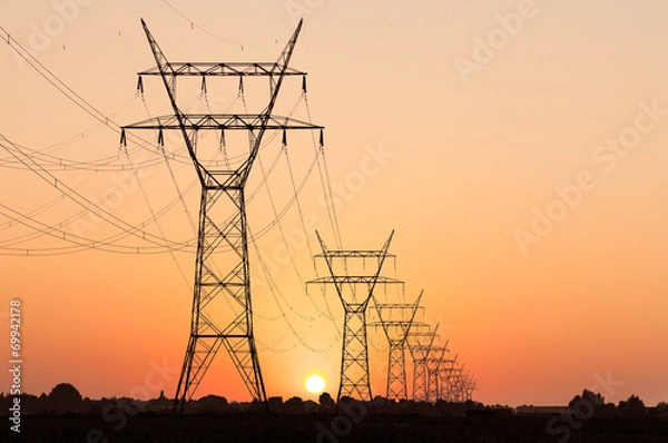 Obraz High voltag pylon in landscape during sunset