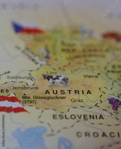 Fototapeta vertical map of Austria with the tourist map with the Austrian flag in travel concept