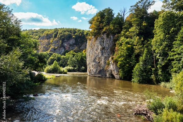 Fototapeta Suncuius rocks over the river