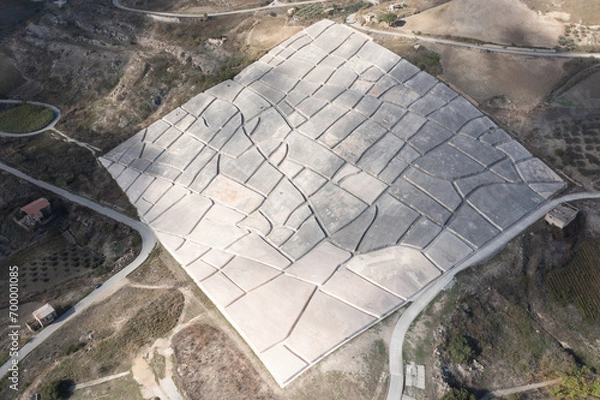 Fototapeta Sicily 2023. Aerial view of the work of art called Cretto di Burri and the surrounding countryside. July 2023 Trapani, Italy