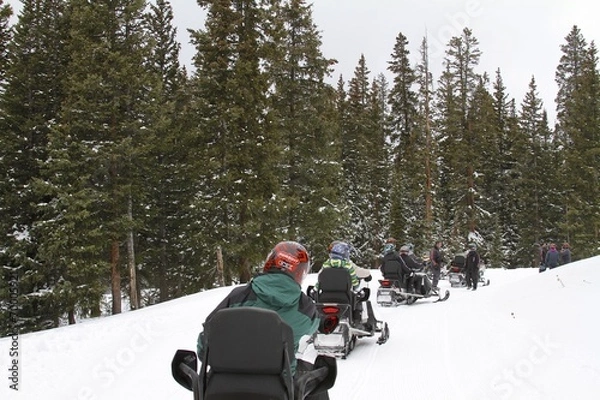 Fototapeta Top of the mountain - Snowmobile ride in Colorado