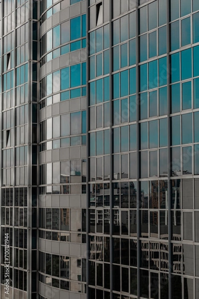 Obraz office building in the city glass windows blue reflection