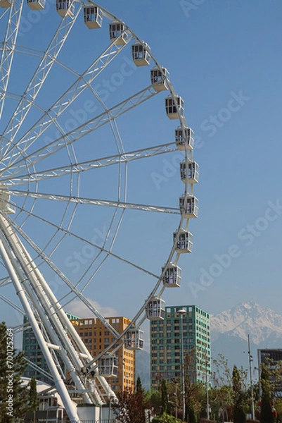 Obraz ferris wheel on a blue sky